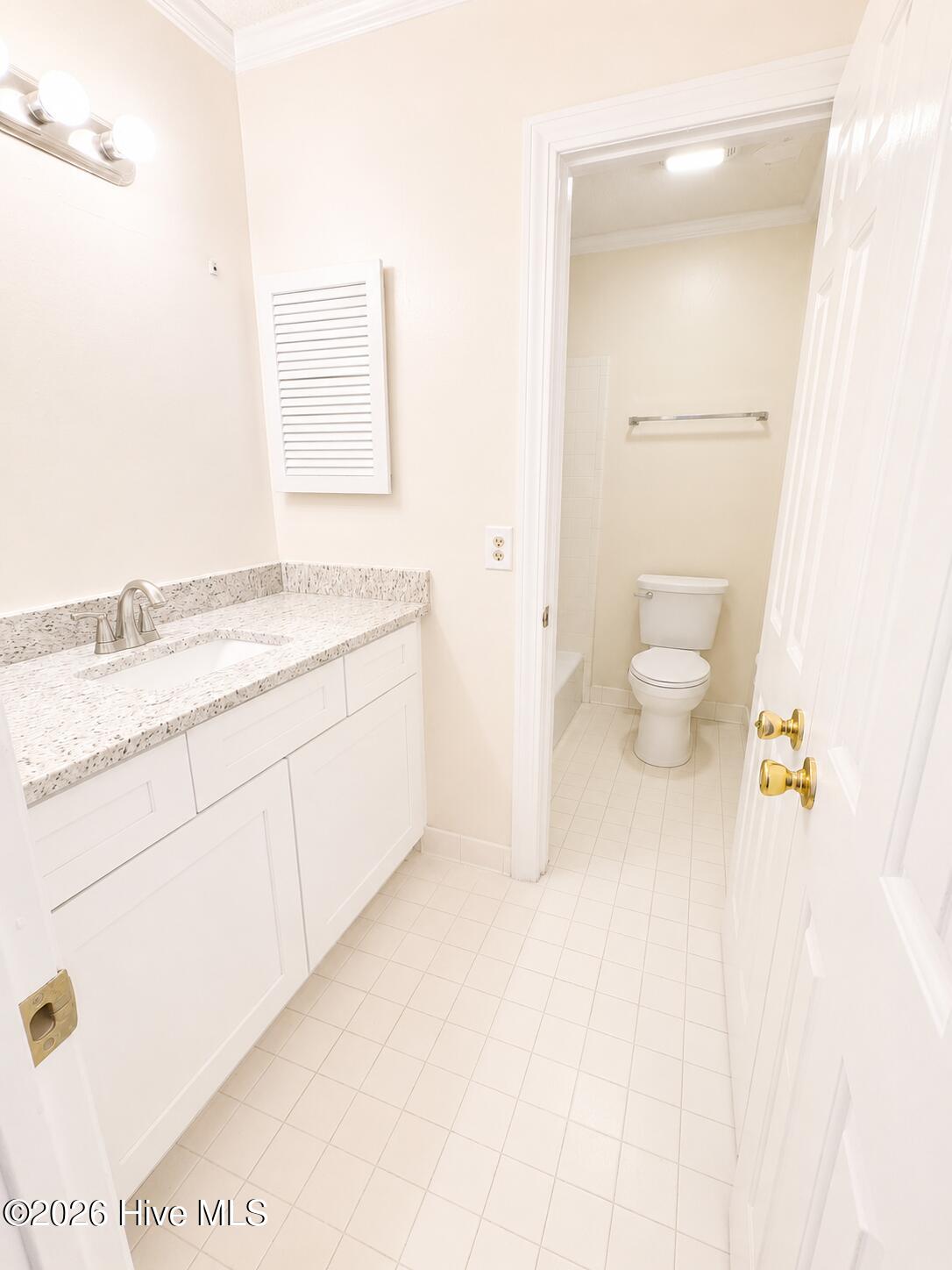 1827 Quail Ridge Road, Unit A Greenville, NC 27858 - Photo 14 of 17 Hall Bathroom