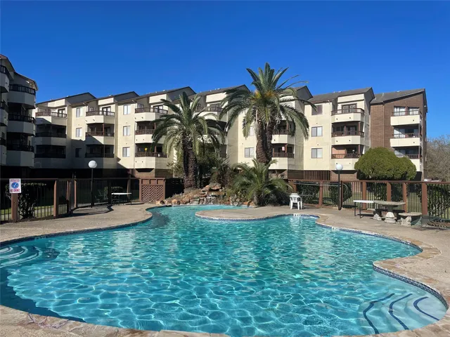 a view of a house with outdoor space and sitting area