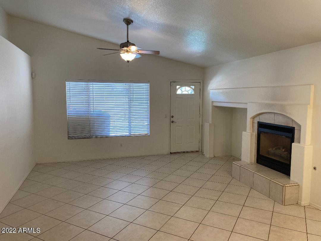 4454 East Rowel Road Phoenix, AZ 85050 - Photo 9 of 10 Family Room w/ Gas Fireplace
