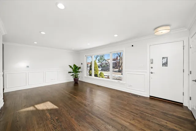 a view of a livingroom with wooden floor