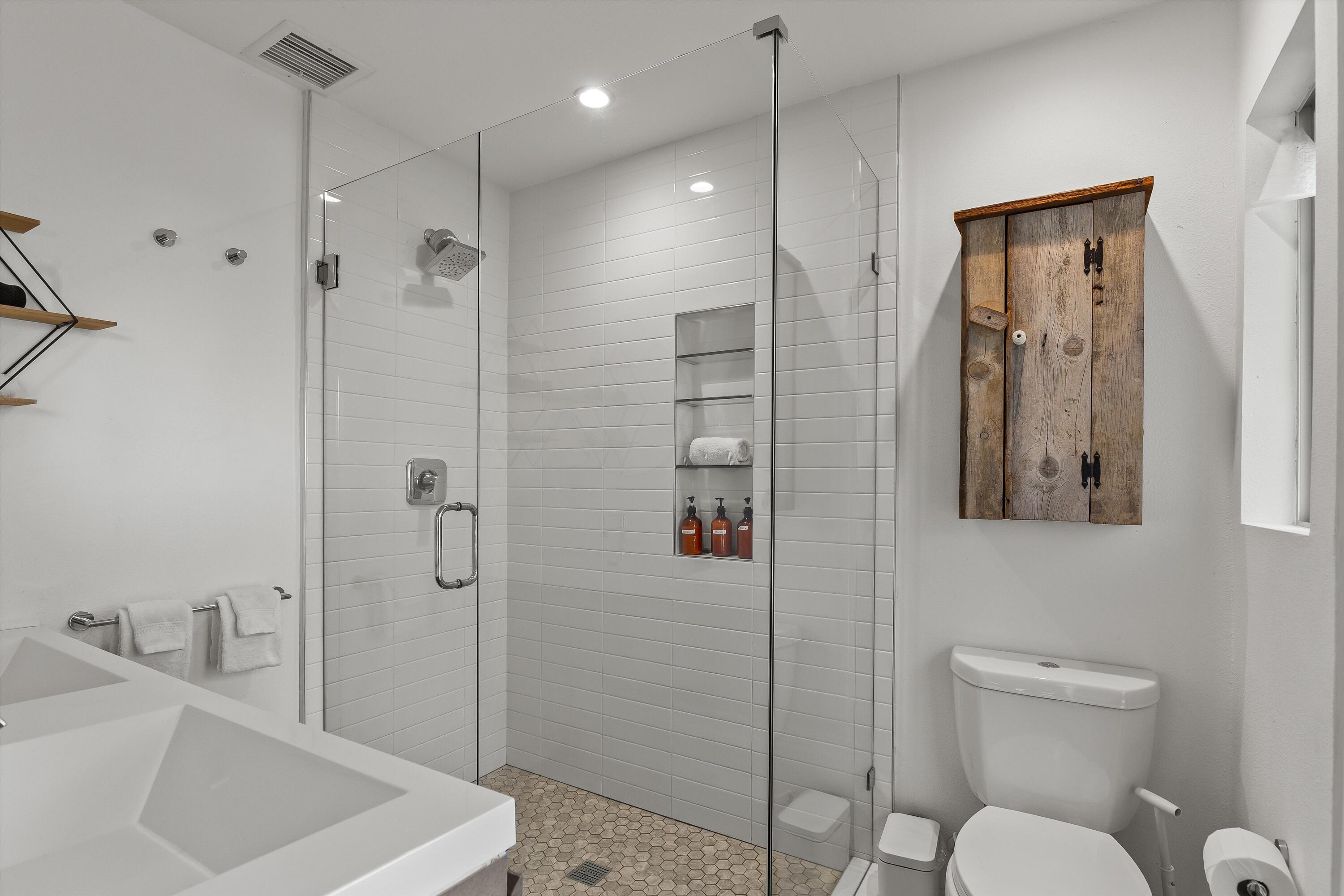 57113 Farrelo Road Yucca Valley, CA 92284 - Photo 24 of 46 a bathroom with a sink a toilet and shower