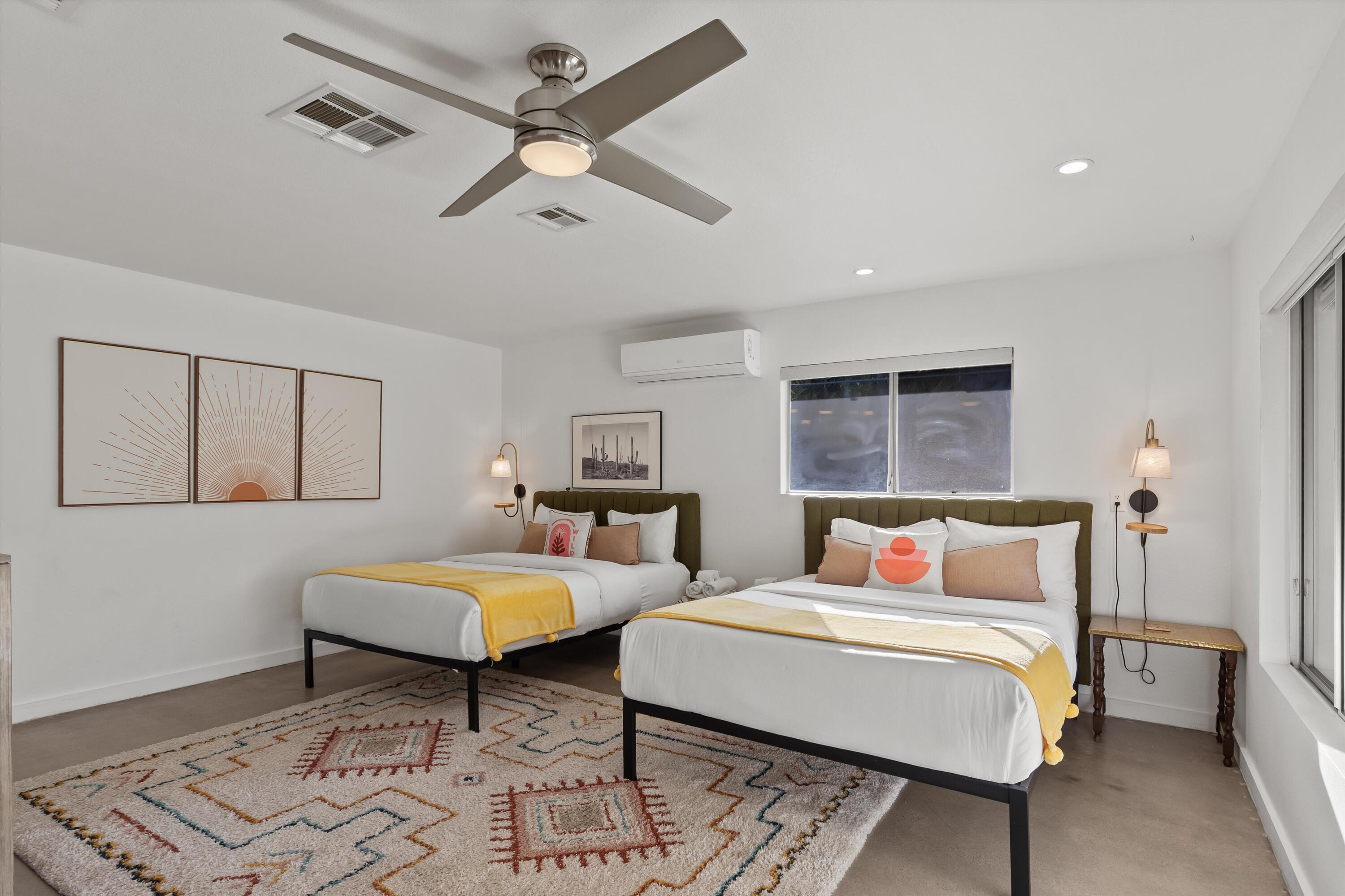 57113 Farrelo Road Yucca Valley, CA 92284 - Photo 35 of 46 a bedroom with a bed and window