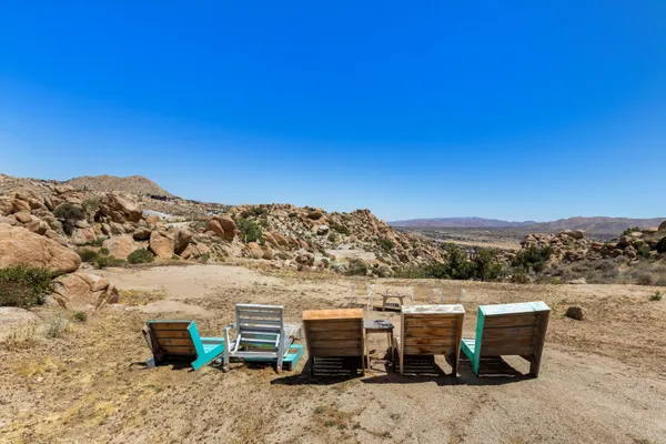 a view of a terrace with furniture