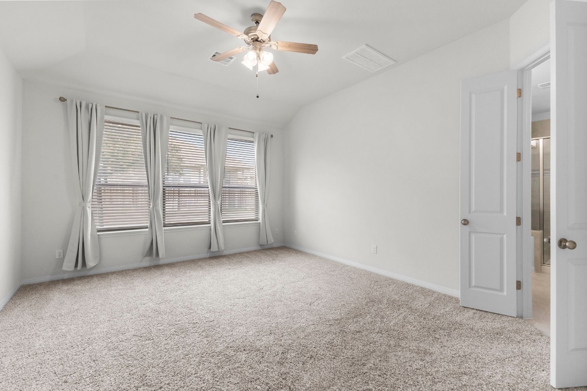104 Scenic Hills Circle Georgetown, TX 78628 - Photo 19 of 30 a view of an empty room with a window