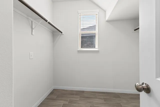 a view of small space with racks on the wall