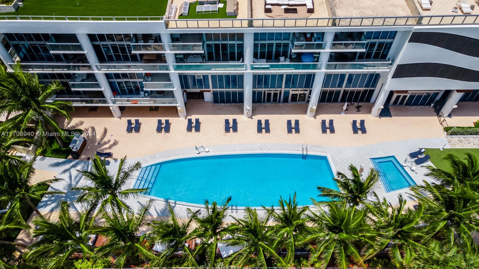 6799 Collins Avenue, Unit 207 Miami Beach, FL 33141 - Photo 32 of 35 a view of balcony with an outdoor space and seating