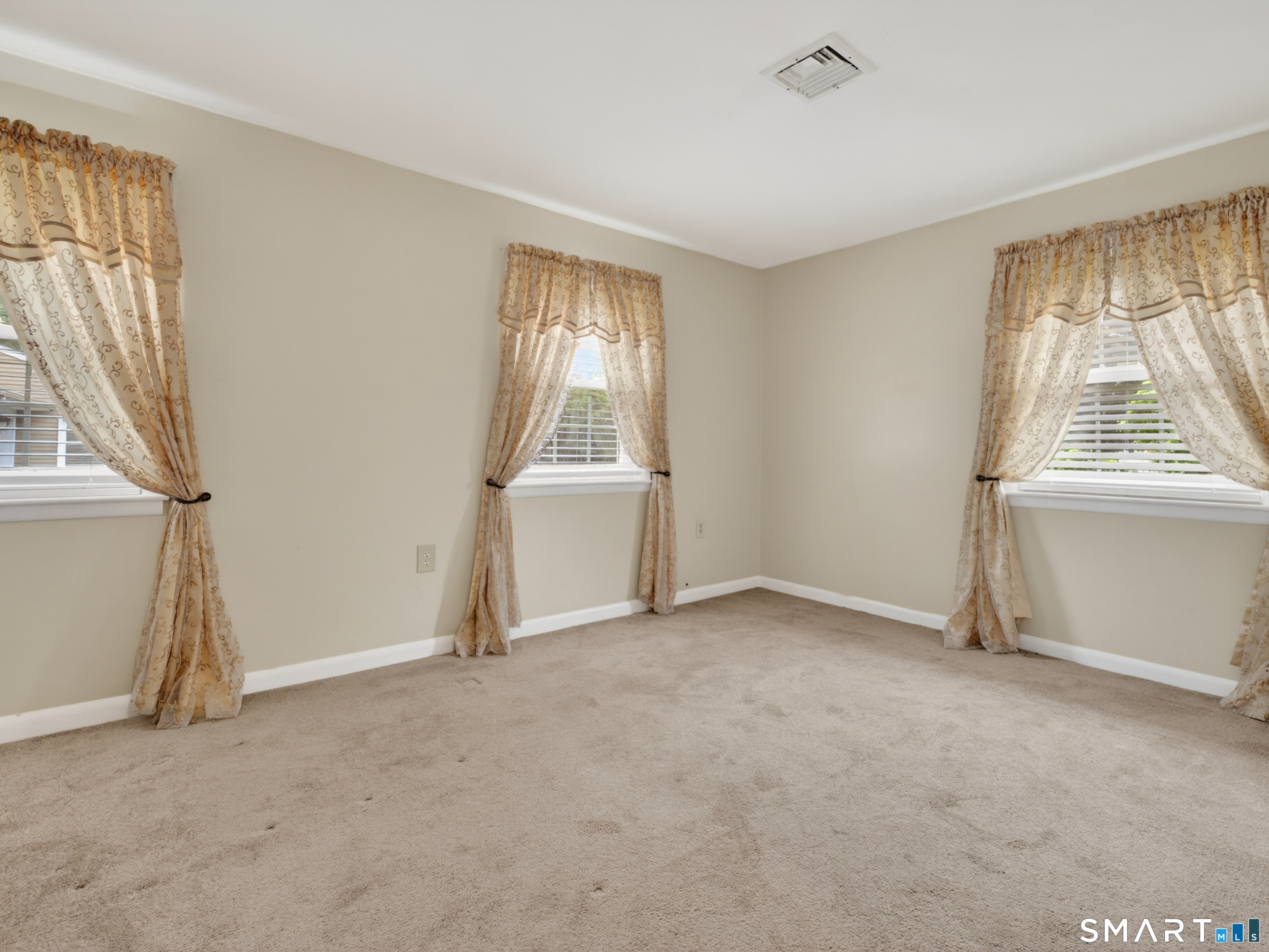 235 Scotland Road Norwich, CT 06360 - Photo 20 of 31 an empty room with windows