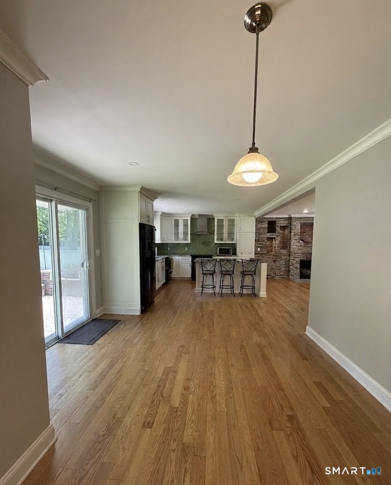 2182 North Benson Road Fairfield, CT 06824 - Photo 5 of 21 a view of a room with furniture wooden floor and window