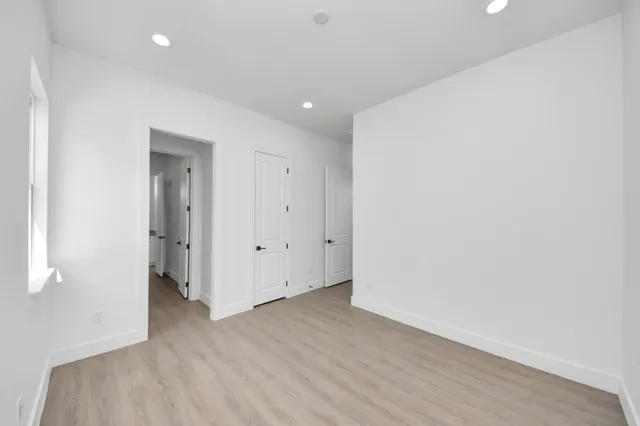 a view of a bathroom with a sink and a mirror