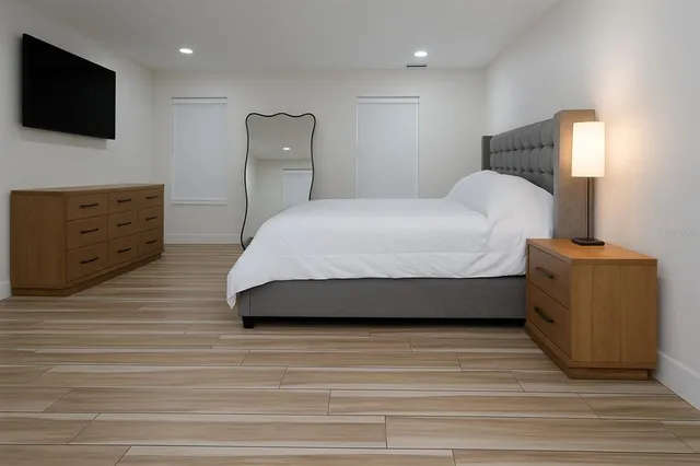 a bathroom with a toilet sink and shower