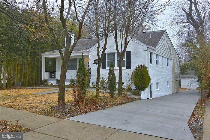 2300 Darrow Street Silver Spring, MD 20902 - Photo 3 of 30 a view of a house with a yard and large tree