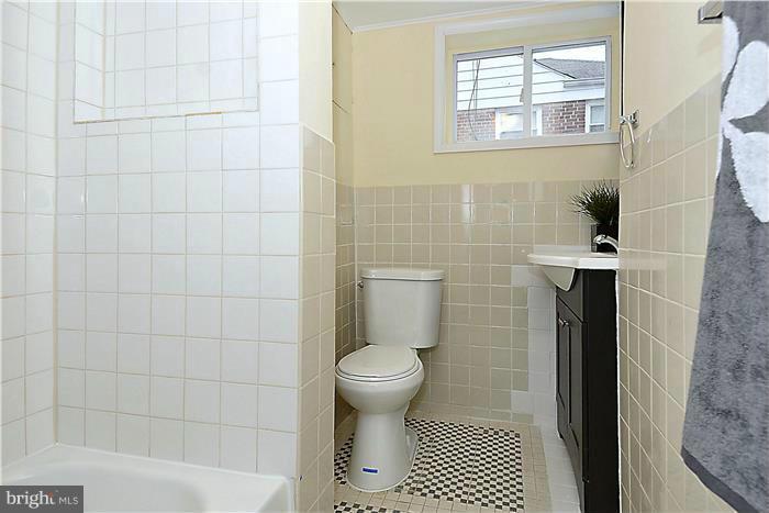 2300 Darrow Street Silver Spring, MD 20902 - Photo 25 of 30 a bathroom with a toilet and a shower
