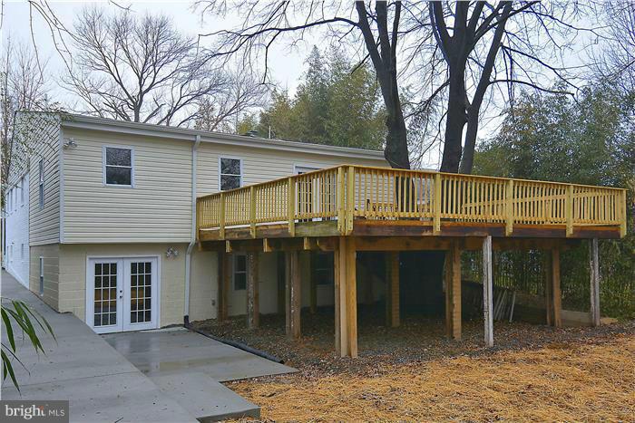 2300 Darrow Street Silver Spring, MD 20902 - Photo 4 of 30 a view of a house with a yard and wooden fence