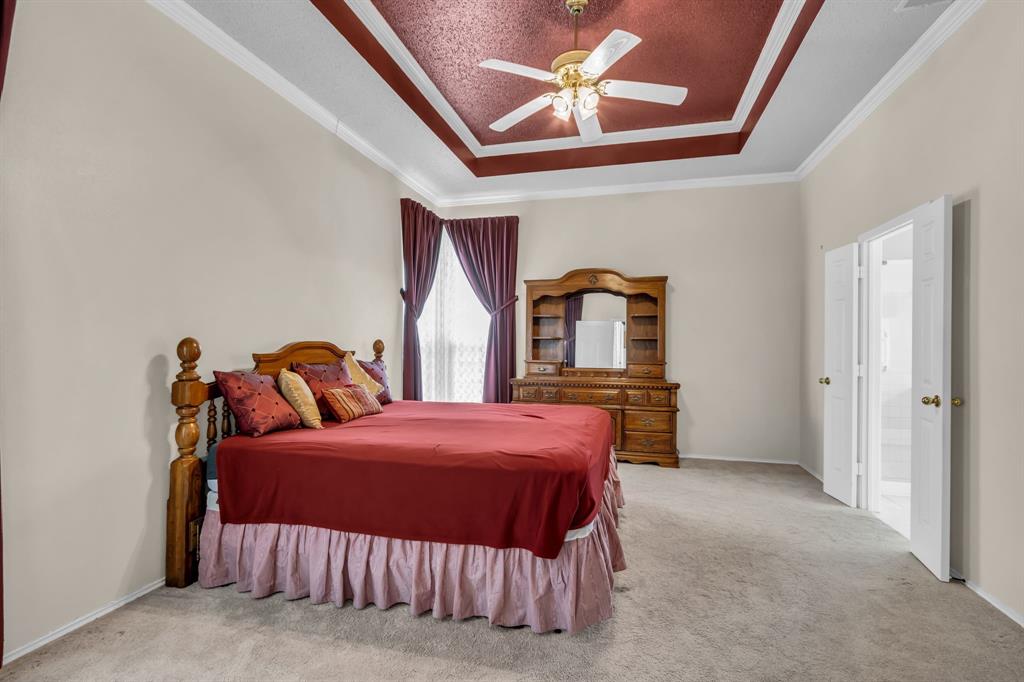 513 Cameron Lane Allen, TX 75002 - Photo 18 of 33 Notice the recessed ceiling, fan, and crown molding in this roomy master!