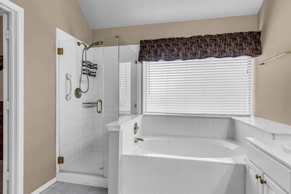 513 Cameron Lane Allen, TX 75002 - Photo 21 of 33 Imagine relaxing after a long day in this corner garden tub with its whirling jets!
