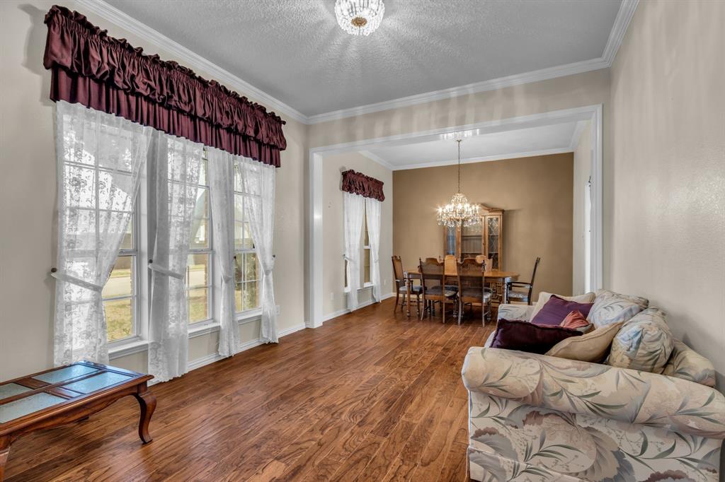 513 Cameron Lane Allen, TX 75002 - Photo 6 of 33 To the left of the foyer, you are greeted by a very formal living and dining room! Great for those very special occasions!