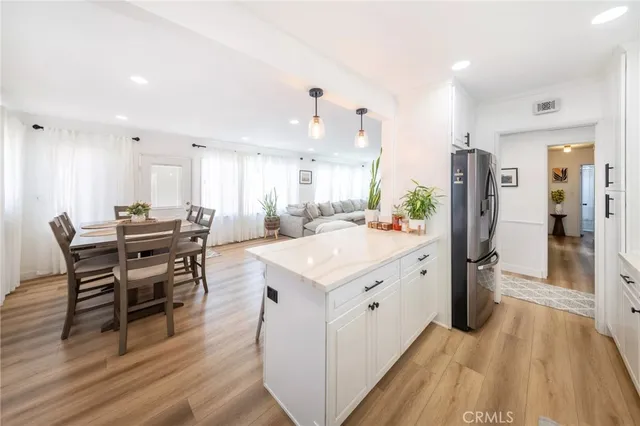 a kitchen with a stove and a microwave
