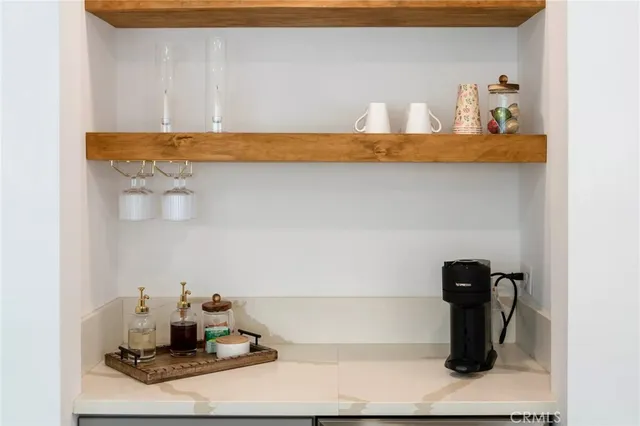 a bedroom with a large bed and a couch