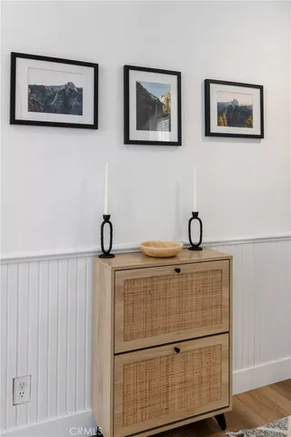 a bedroom with a bed and a table