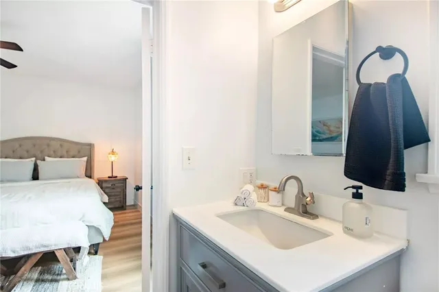 a view of a porch with furniture and a backyard