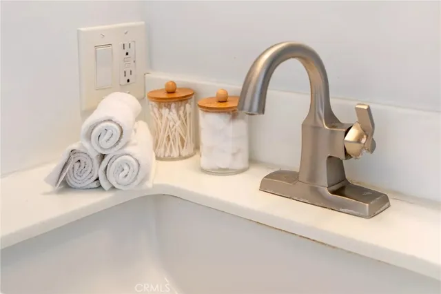 a view of a patio with table and chairs barbeque with wooden floor and fence