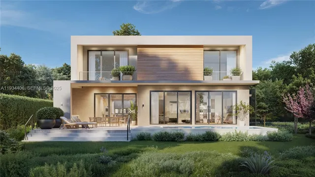 a view of a house with backyard and porch