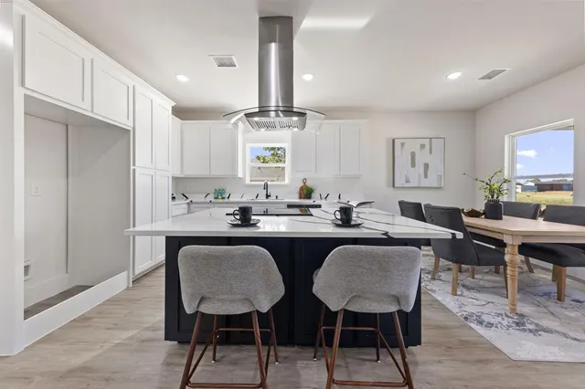 a view of kitchen with breakfast area
