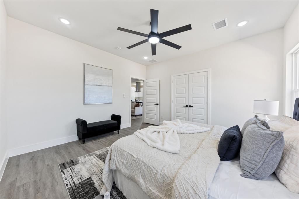 315 Windjammer Road Gun Barrel City, TX 75156 - Photo 19 of 32 a bedroom with a bed furniture and a window