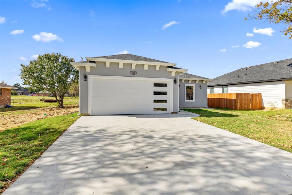 315 Windjammer Road Gun Barrel City, TX 75156 - Photo 2 of 32 a front view of a house with a yard