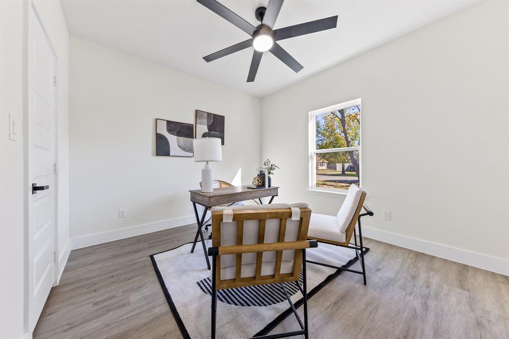 315 Windjammer Road Gun Barrel City, TX 75156 - Photo 23 of 32 a dining room with a wooden table and chairs