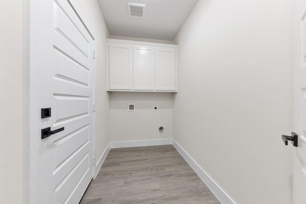 315 Windjammer Road Gun Barrel City, TX 75156 - Photo 26 of 32 a view of walk in closet with empty racks