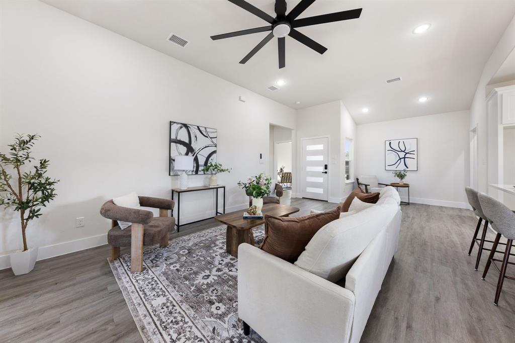 315 Windjammer Road Gun Barrel City, TX 75156 - Photo 7 of 32 a living room with furniture and a wooden floor