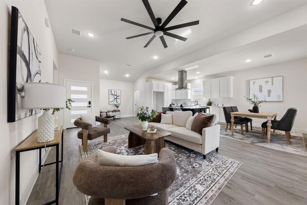 315 Windjammer Road Gun Barrel City, TX 75156 - Photo 8 of 32 a living room with furniture kitchen view and a chandelier