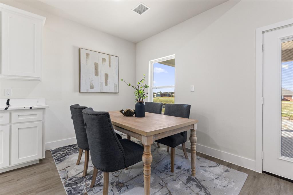315 Windjammer Road Gun Barrel City, TX 75156 - Photo 10 of 32 a view of a dining room with furniture