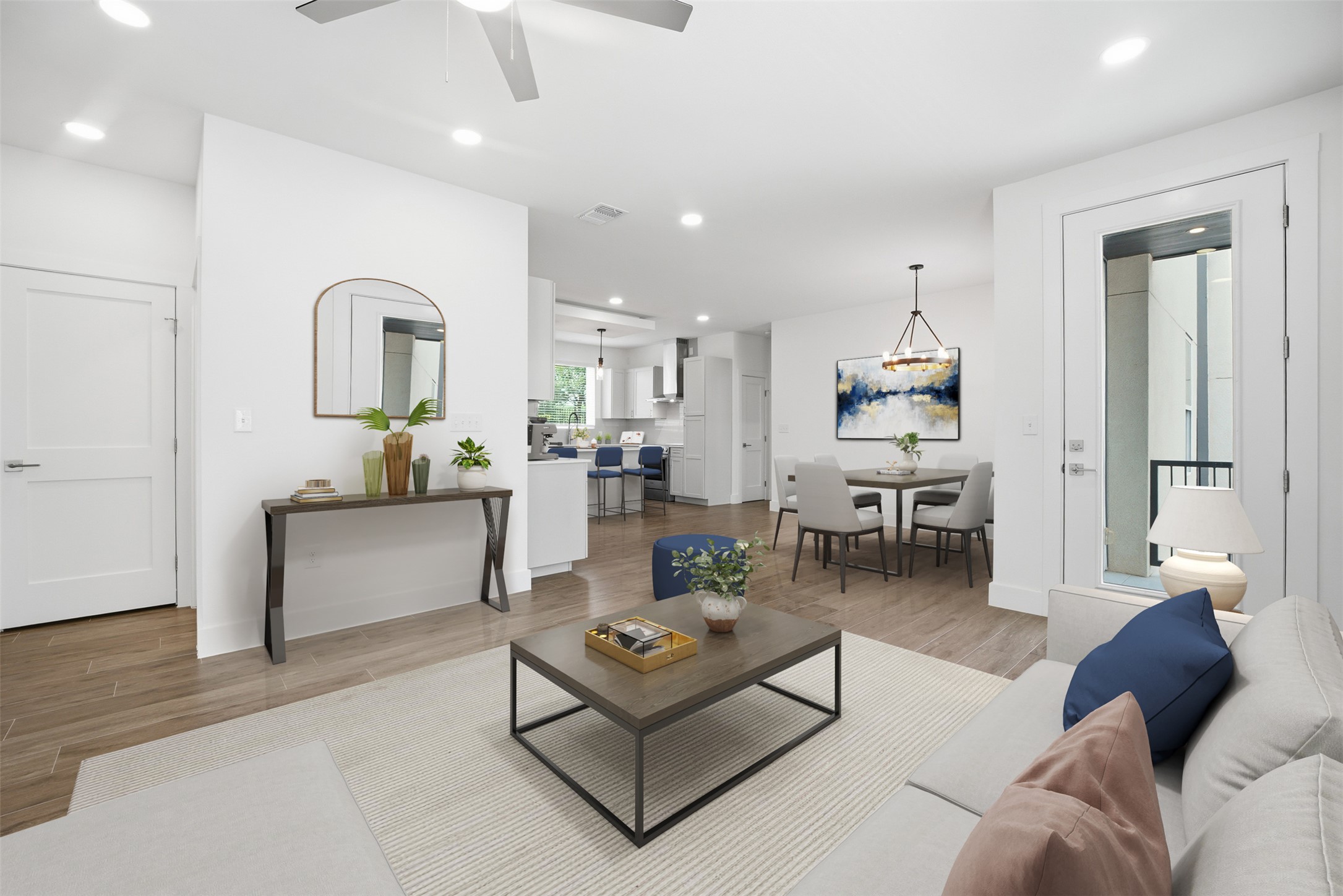 4300 Mansfield Dam Road, Unit 1021 Austin, TX 78734 - Photo 14 of 40 Bright open-concept living area featuring wood look tile-finish flooring, recessed lighting, a ceiling fan, and a white paneled door
