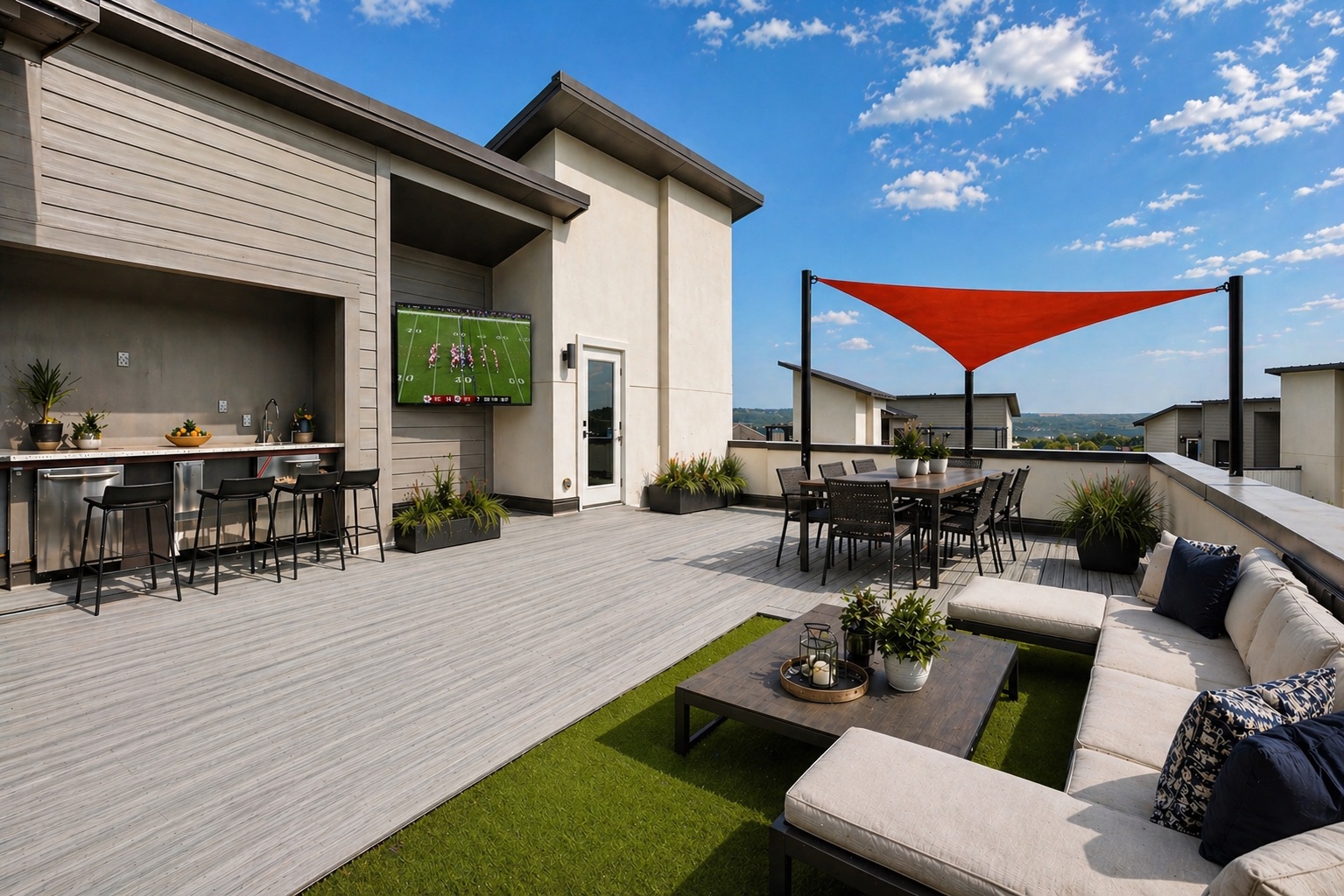 4300 Mansfield Dam Road, Unit 1021 Austin, TX 78734 - Photo 2 of 40 Expansive rooftop terrace with a built-in outdoor wet bar, composite decking, and artificial turf accents