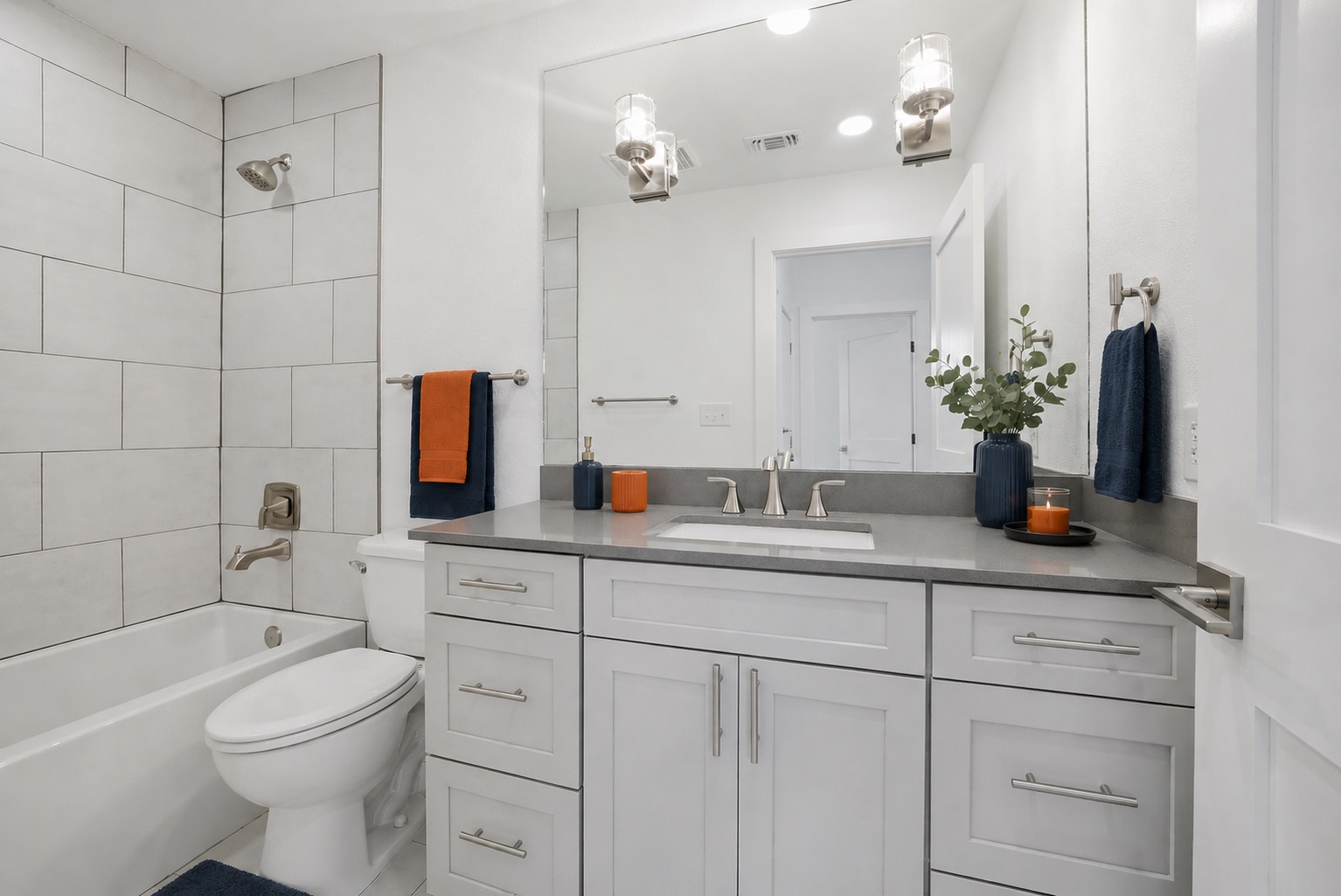 4300 Mansfield Dam Road, Unit 1021 Austin, TX 78734 - Photo 29 of 40 Bathroom featuring a single vanity with light cabinetry, a rectangular undermount sink, and a gray countertop