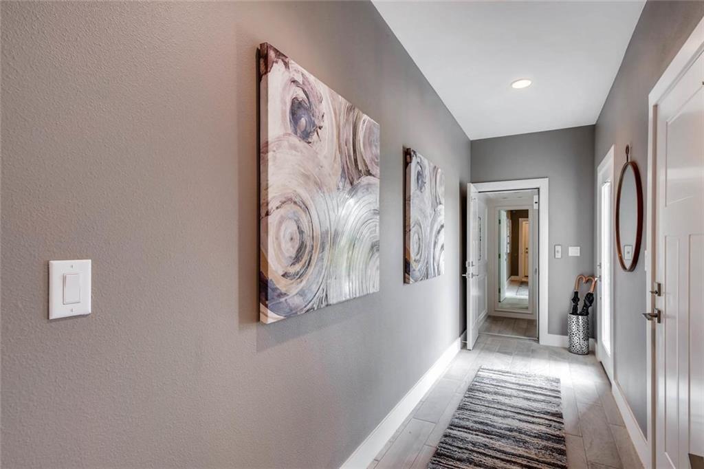 4300 Mansfield Dam Road, Unit 1021 Austin, TX 78734 - Photo 10 of 40 Welcoming private entry foyer with convenient garage access through the first door on the right.