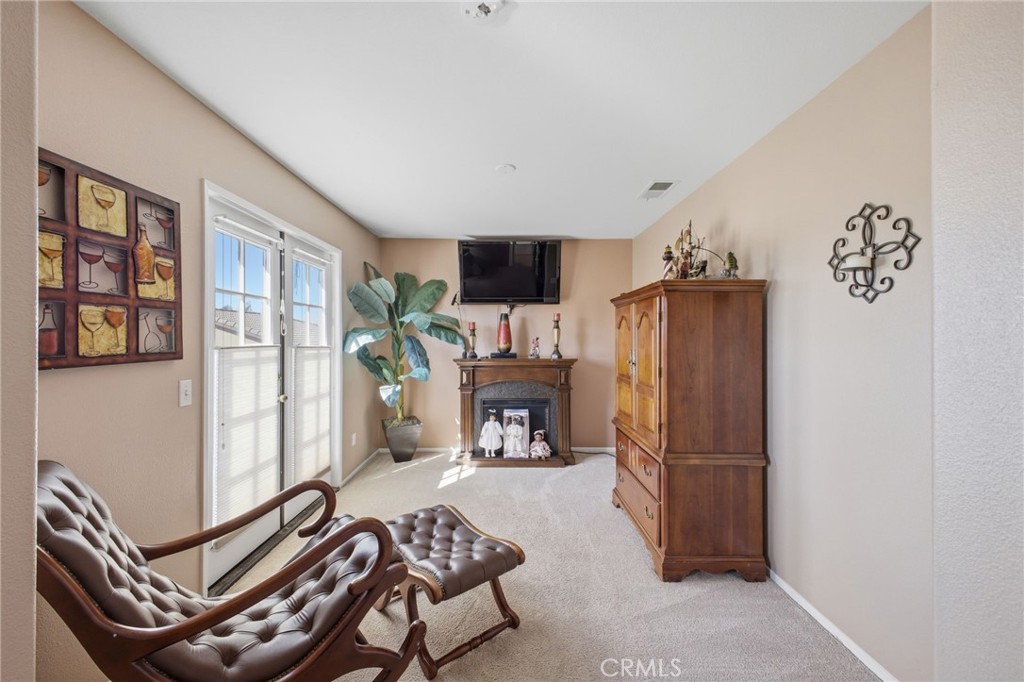 785 Pine Ridge Circle Beaumont, CA 92223 - Photo 47 of 60 Retreat off primary bedroom.. leads out to a beautiful balcony through french doors