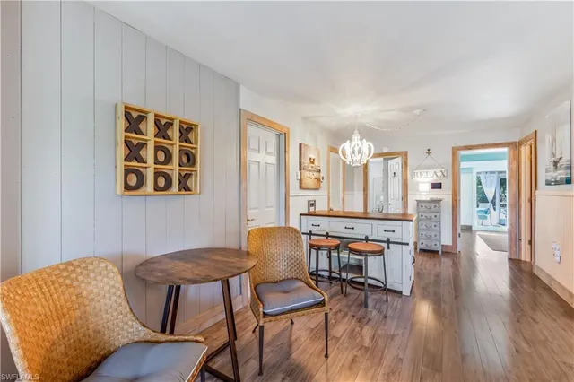 a room with furniture and wooden floor