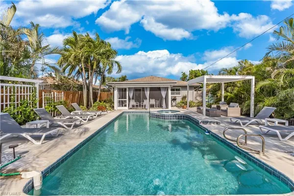 a view of a house with a swimming pool