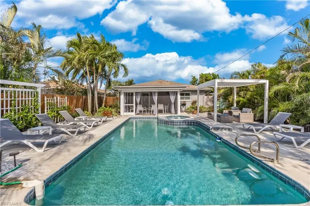 a view of a house with a swimming pool