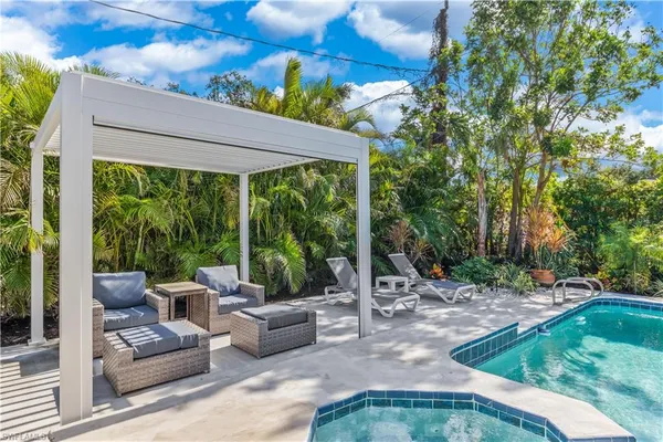 a outdoor living space with furniture and garden view