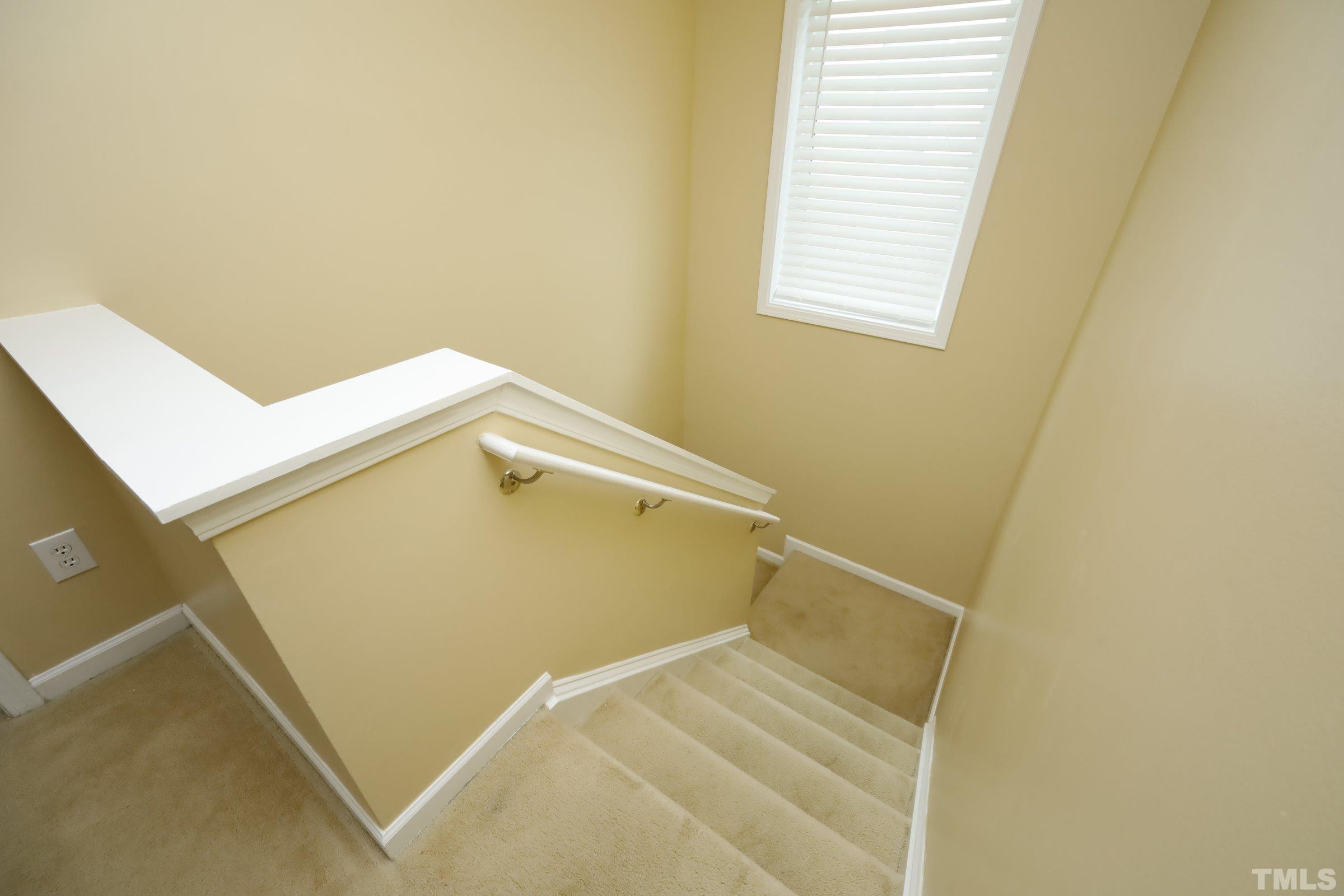 3608 Marshlane Way Raleigh, NC 27610 - Photo 20 of 43 a view of a room with rack and a window