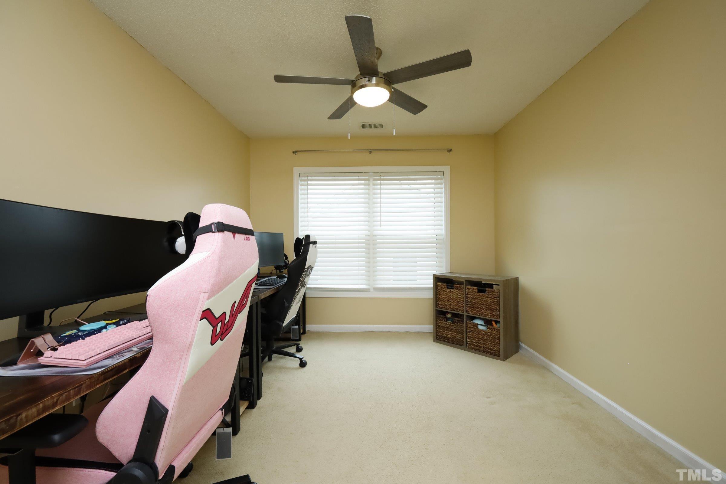 3608 Marshlane Way Raleigh, NC 27610 - Photo 22 of 43 a bed room with furniture and a window