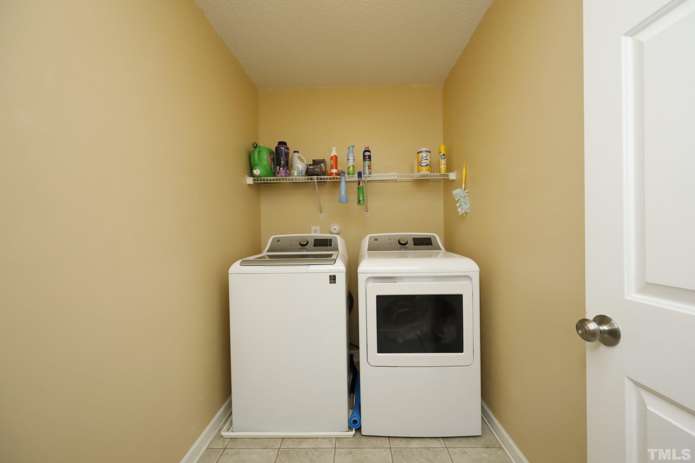 3608 Marshlane Way Raleigh, NC 27610 - Photo 33 of 43 a utility room with dryer and washer