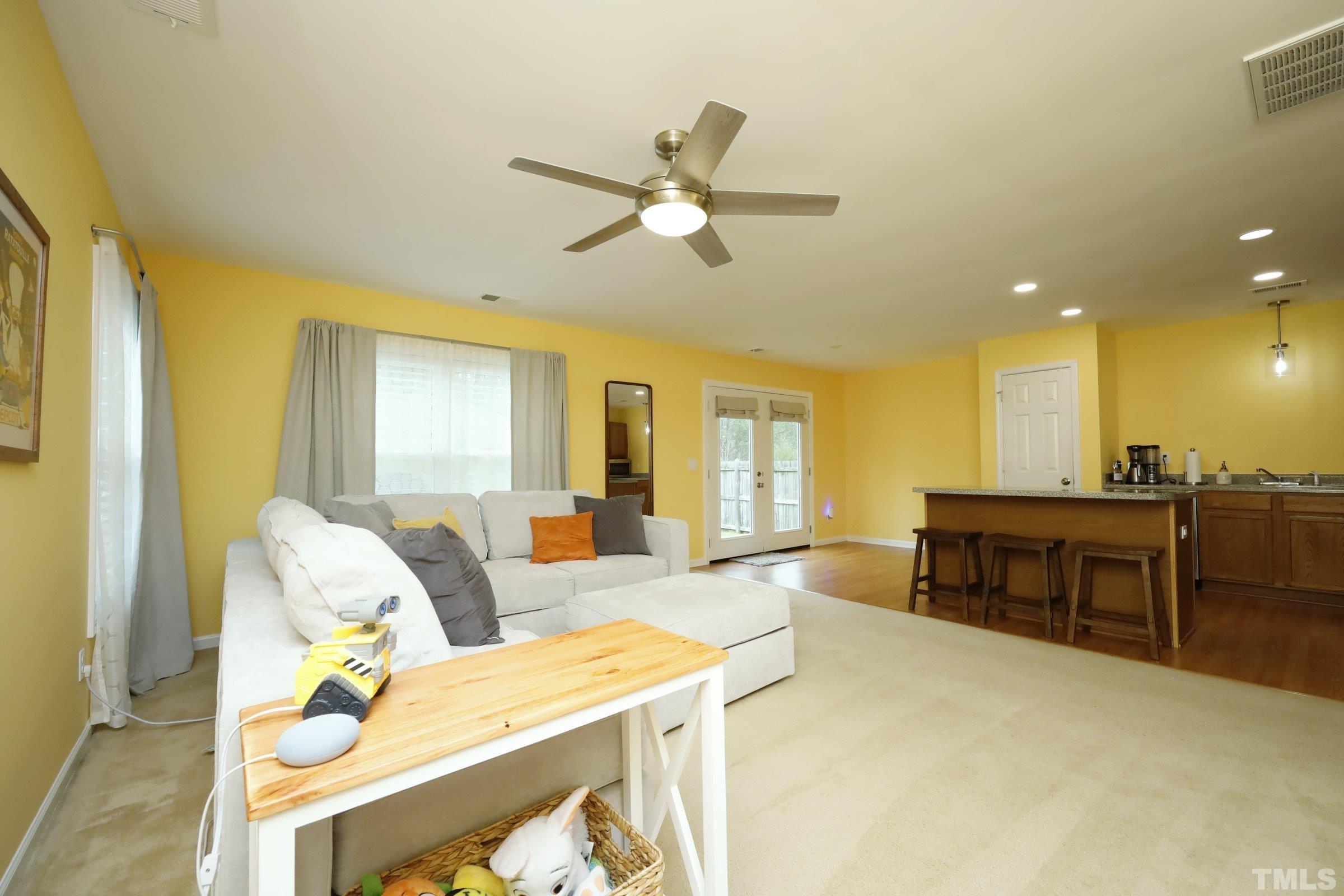3608 Marshlane Way Raleigh, NC 27610 - Photo 7 of 43 a living room with furniture and a table