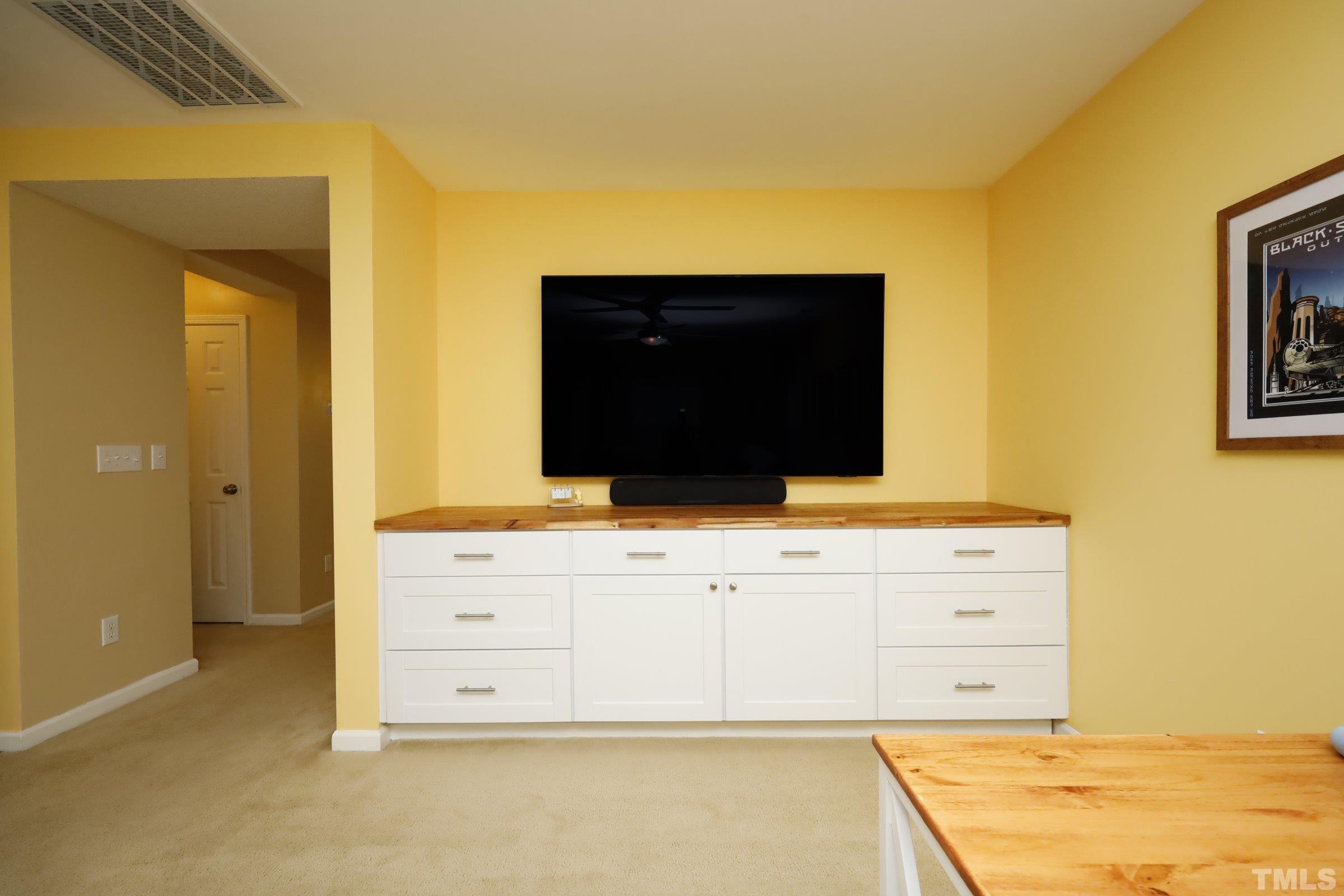 3608 Marshlane Way Raleigh, NC 27610 - Photo 8 of 43 a bathroom with a sink vanity and a mirror