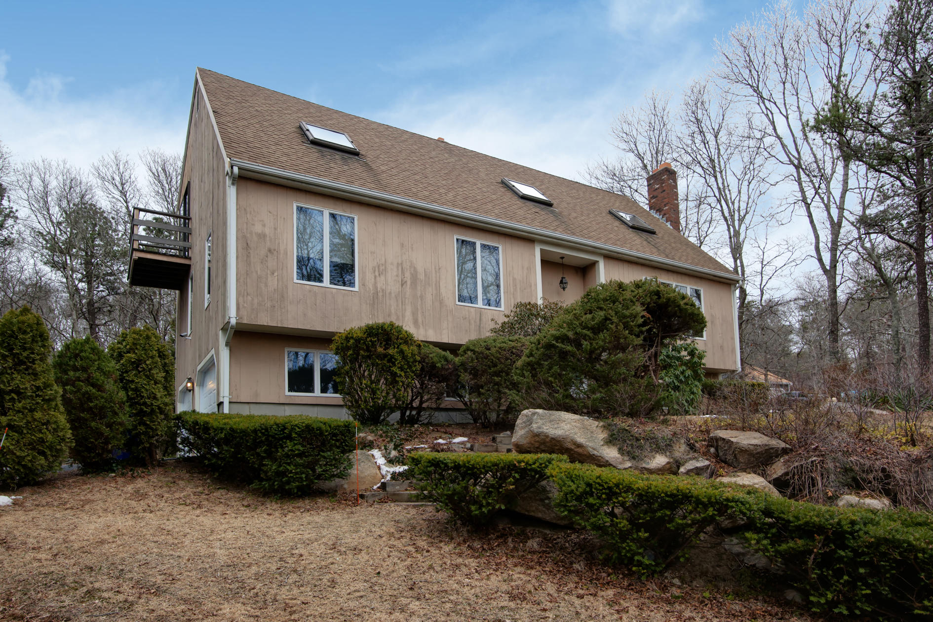 3 Easting Road Bourne, MA 02532 - Photo 2 of 35 a front view of a house with a yard