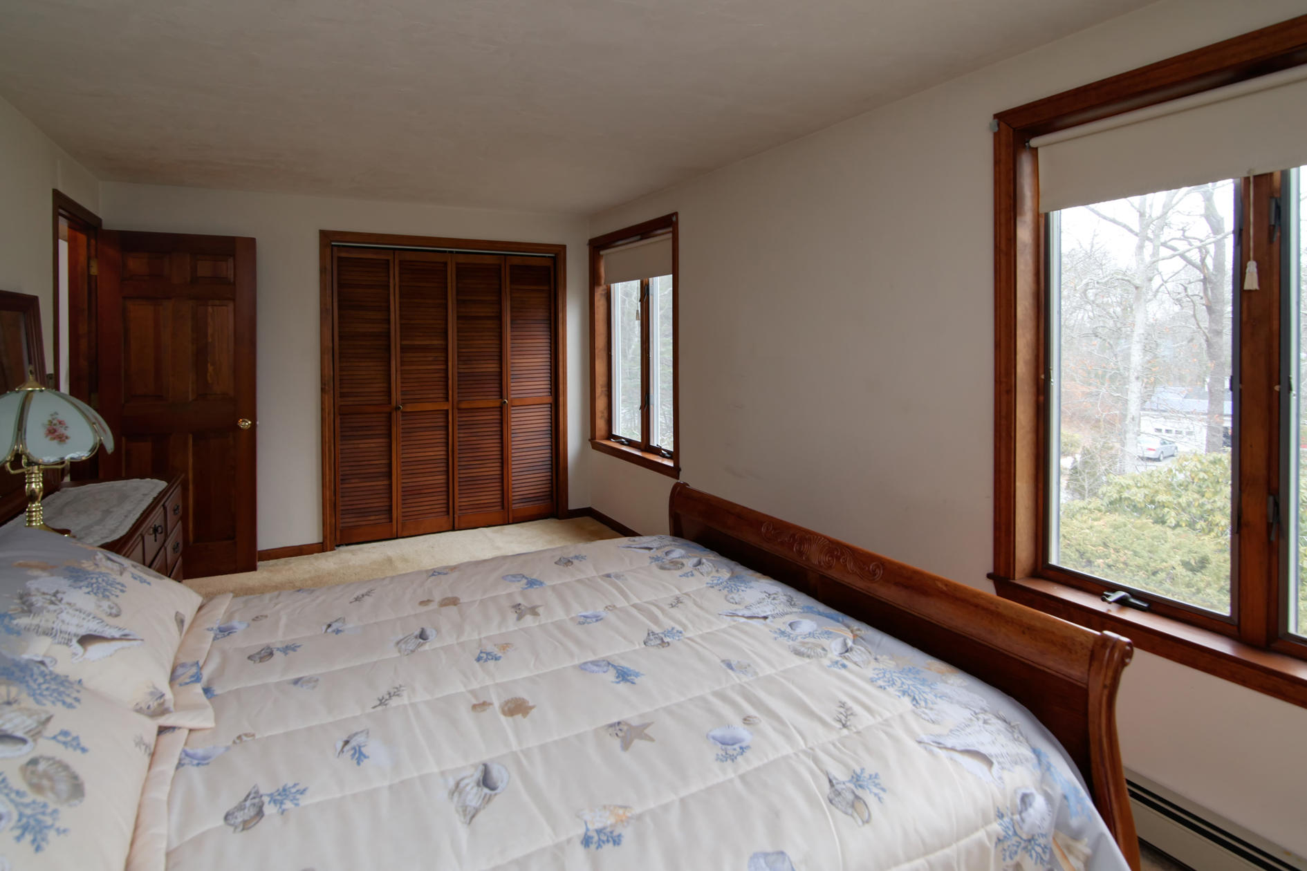 3 Easting Road Bourne, MA 02532 - Photo 21 of 35 a bed sitting in a bedroom next to a window